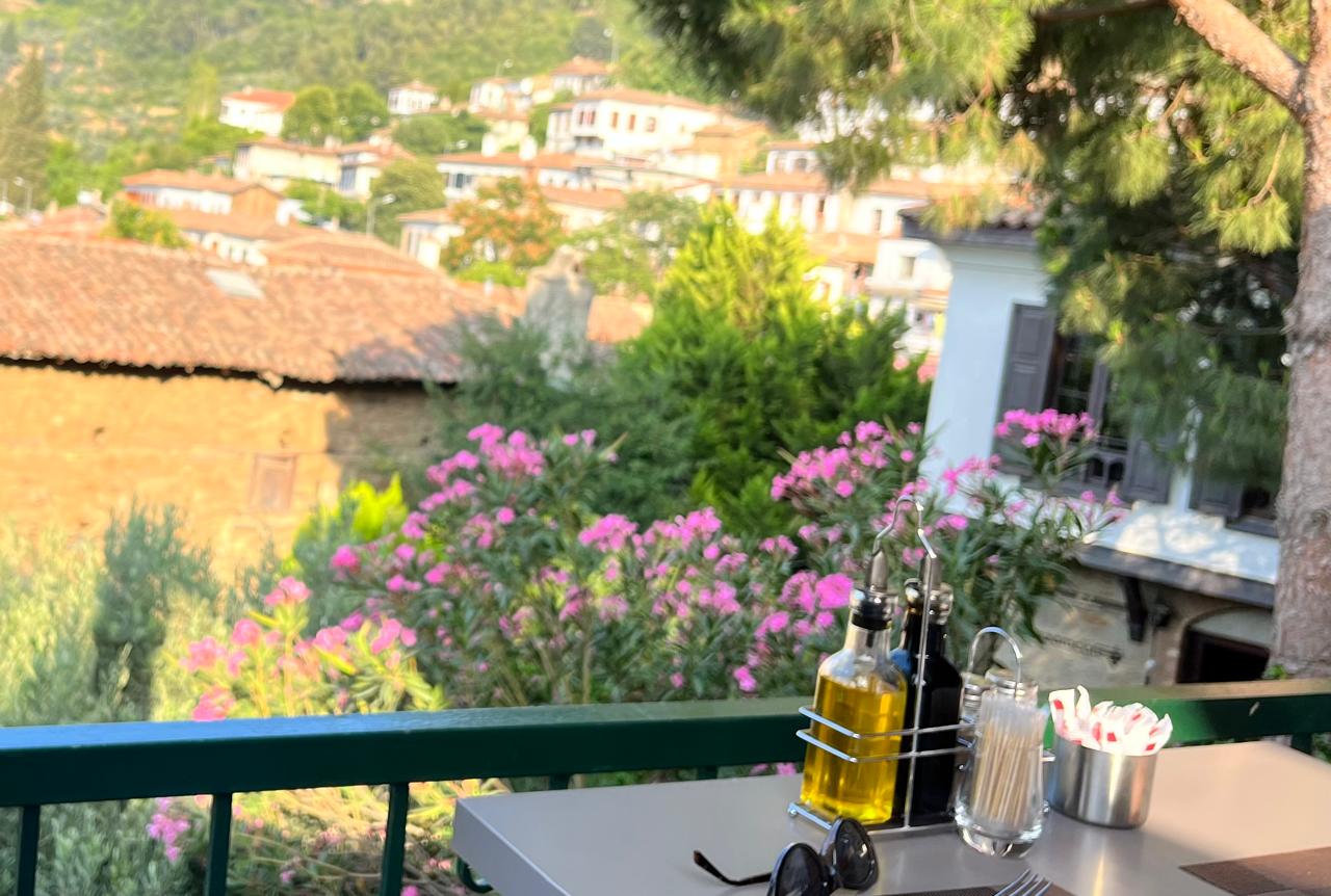 Outdoor cafe terrace with a view of Şirince valley